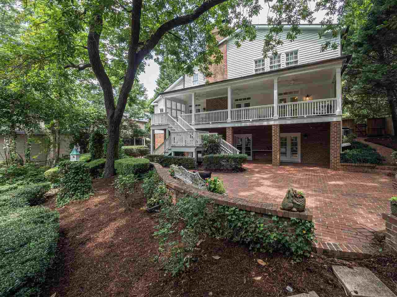 1913 Lewis Circle Raleigh, NC 27608 - Photo 4 of 30 Full Back Veranda Overlooks Park Like Setting Accessible From Family Room and Study Veranda