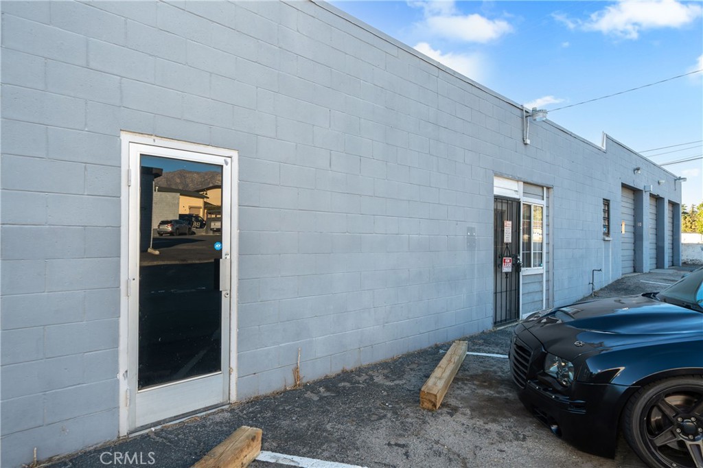 35026 Yucaipa Boulevard, Unit C Yucaipa, CA 92399 - Photo 3 of 14 a car parked in front of a house