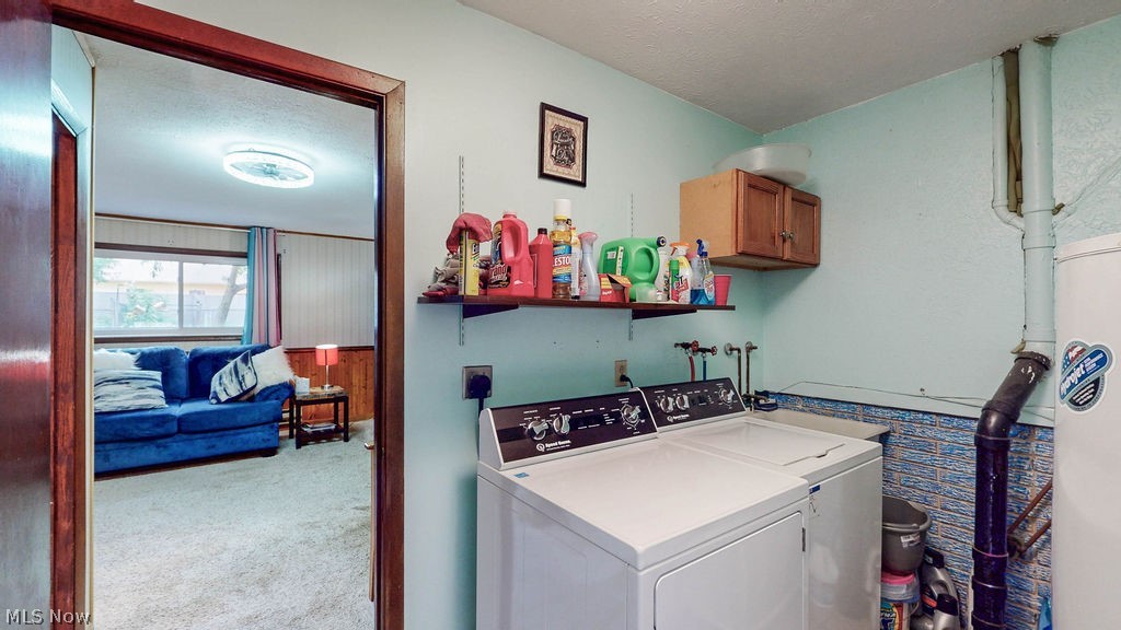 38667 Chestnut Ridge Road Elyria, OH 44035 - Photo 25 of 35 Dedicated laundry area featuring a utility sink, upper cabinetry, and shelving