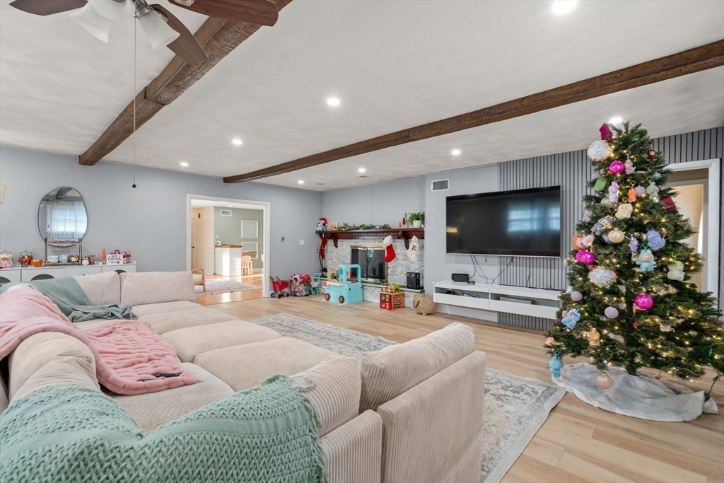 46 Ramshorn Road Dudley, MA 01571 - Photo 13 of 39 a living room with furniture and a flat screen tv