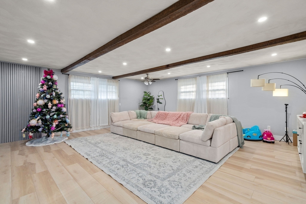 46 Ramshorn Road Dudley, MA 01571 - Photo 14 of 39 a living room with furniture and a potted plant