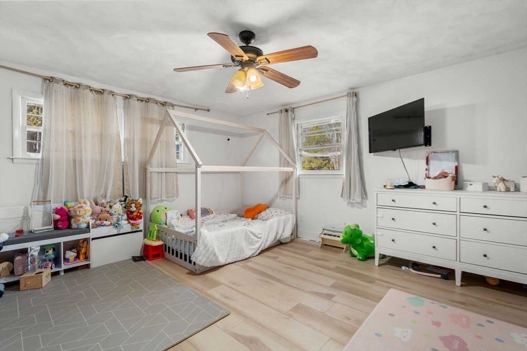 46 Ramshorn Road Dudley, MA 01571 - Photo 15 of 39 a bedroom with furniture and a flat screen tv