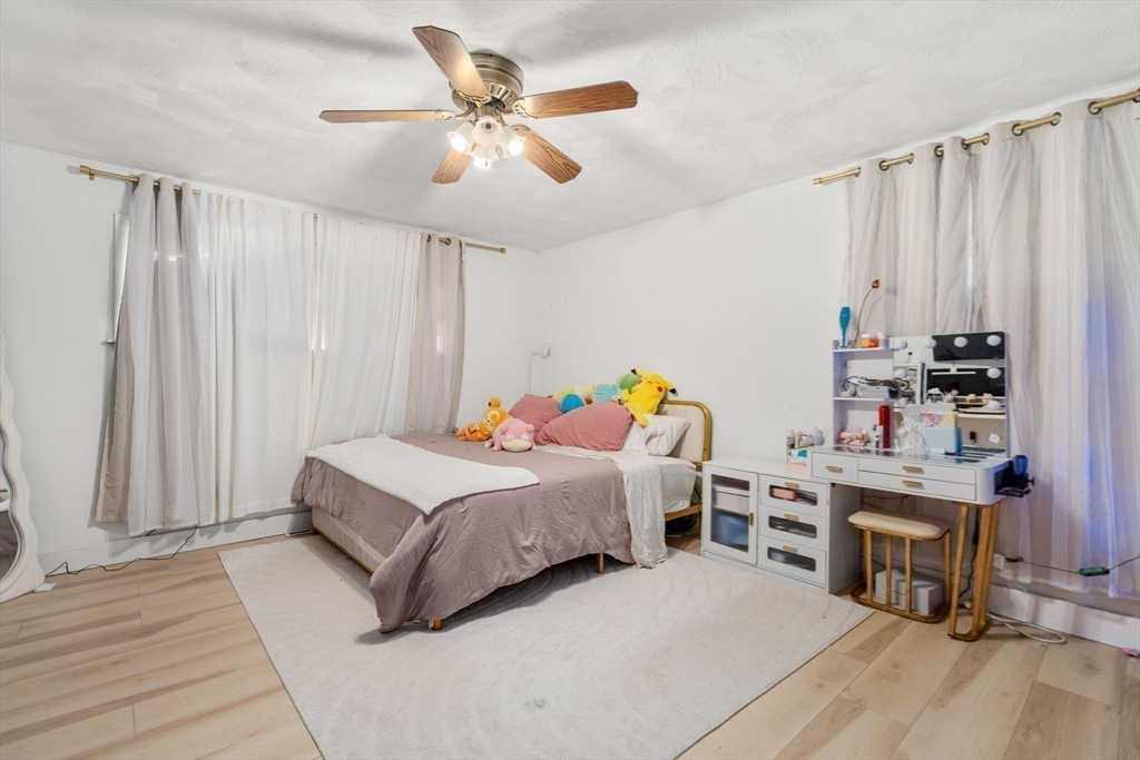 46 Ramshorn Road Dudley, MA 01571 - Photo 16 of 39 a bedroom with a bed furniture and a window