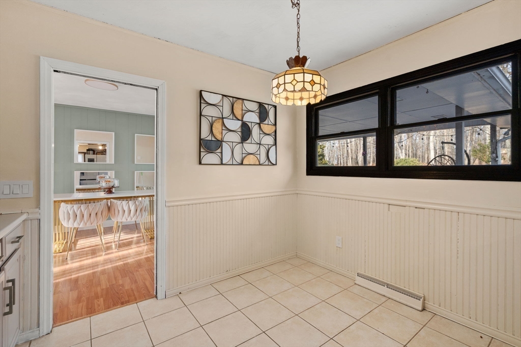 46 Ramshorn Road Dudley, MA 01571 - Photo 24 of 39 a view of a room with a window and chandelier