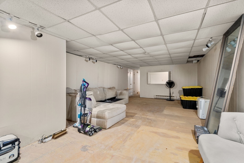 46 Ramshorn Road Dudley, MA 01571 - Photo 29 of 39 a view of a livingroom with furniture and windows