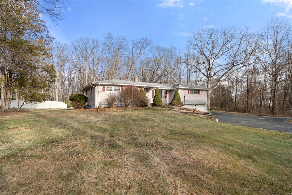 46 Ramshorn Road Dudley, MA 01571 - Photo 3 of 39 a view of backyard of house