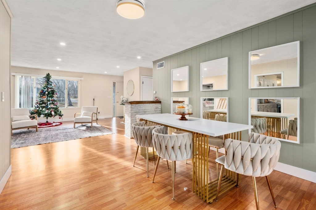 46 Ramshorn Road Dudley, MA 01571 - Photo 8 of 39 a view of a dining room with furniture and wooden floor