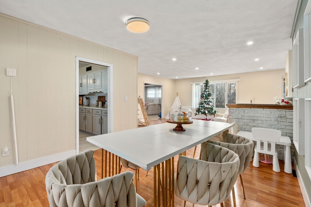 46 Ramshorn Road Dudley, MA 01571 - Photo 9 of 39 a view of a dining room with furniture and wooden floor