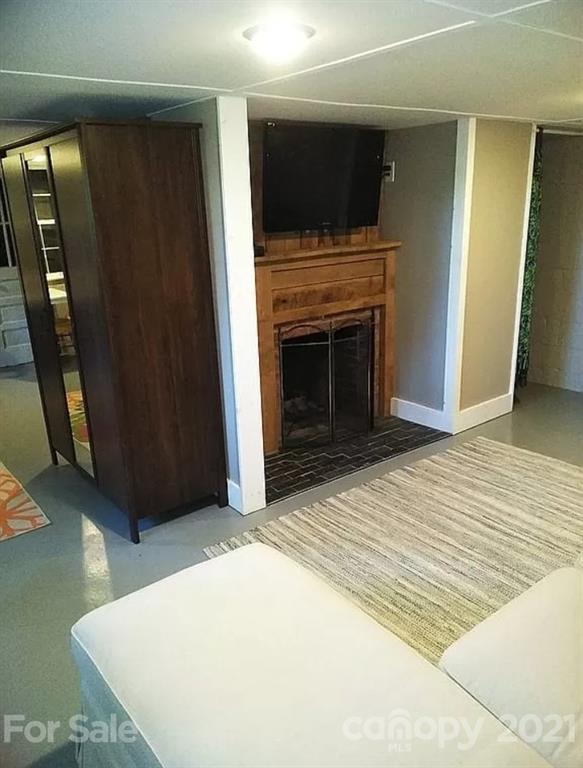 112 John Smith Road Rutherfordton, NC 28139 - Photo 30 of 48 a view of a livingroom with an empty space and a fireplace
