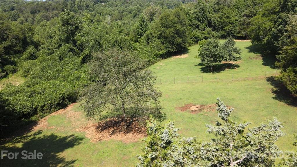 112 John Smith Road Rutherfordton, NC 28139 - Photo 7 of 48 a view of a lake with a yard