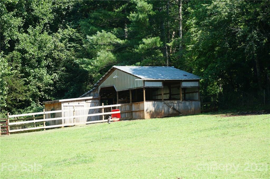 112 John Smith Road Rutherfordton, NC 28139 - Photo 10 of 48 a view of a house with a yard and sitting area