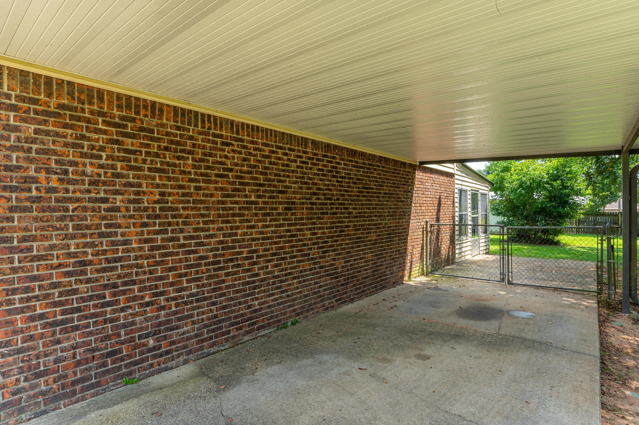 516 Stillwell Boulevard Crestview, FL 32539 - Photo 4 of 22 a view of a building with a outdoor space