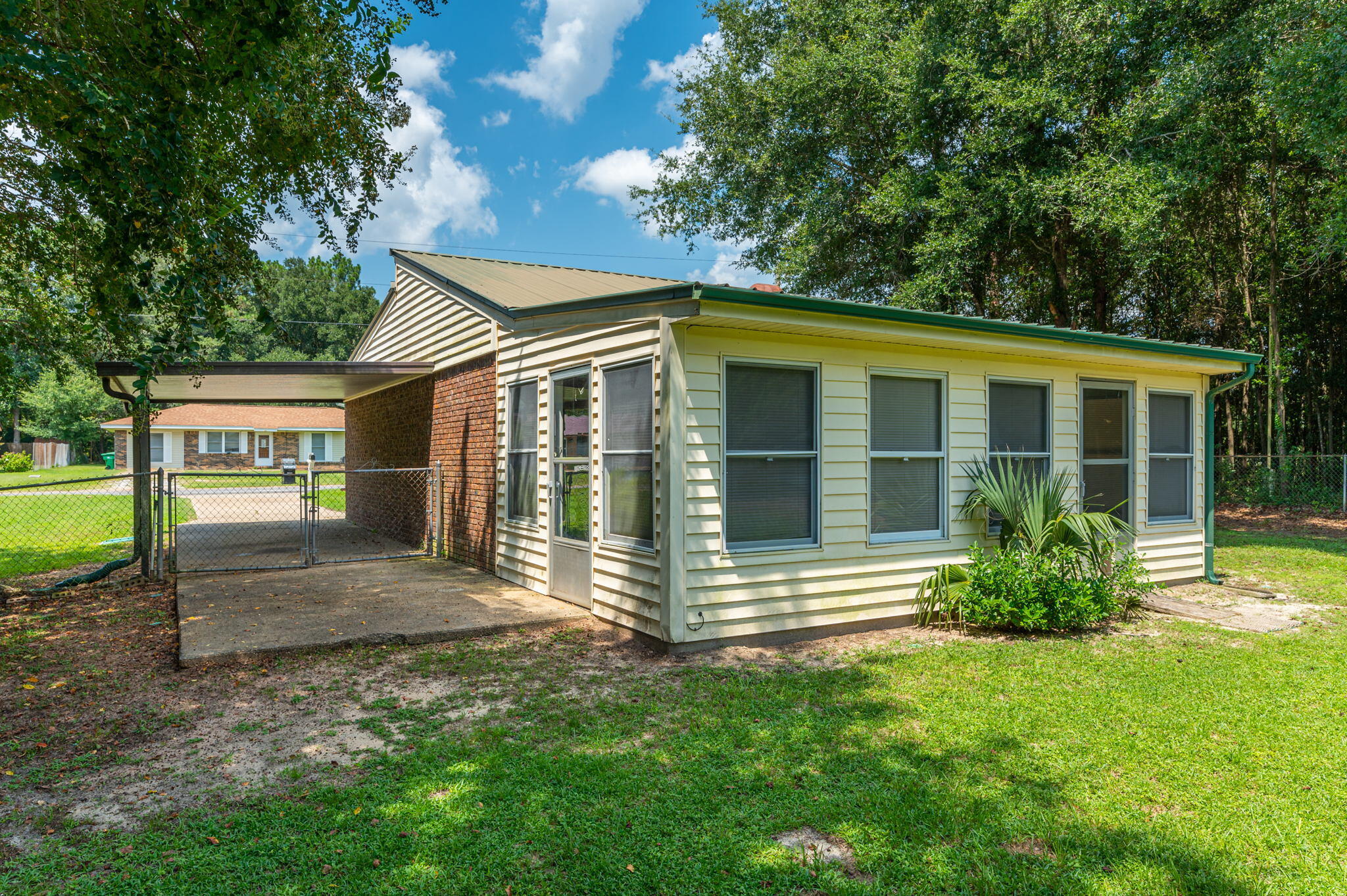 516 Stillwell Boulevard Crestview, FL 32539 - Photo 6 of 22 a view of a house with backyard and garden