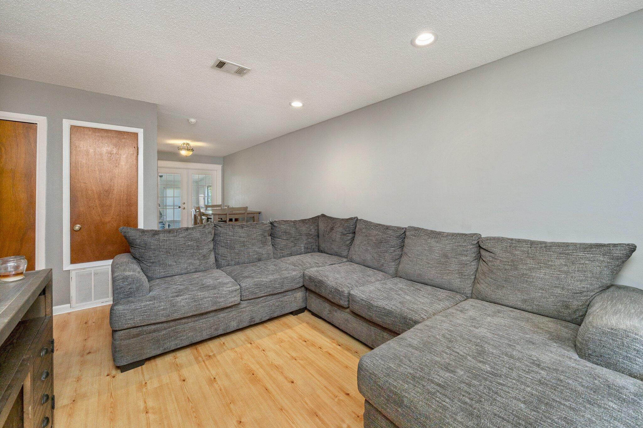 516 Stillwell Boulevard Crestview, FL 32539 - Photo 10 of 22 a living room with furniture and a couch