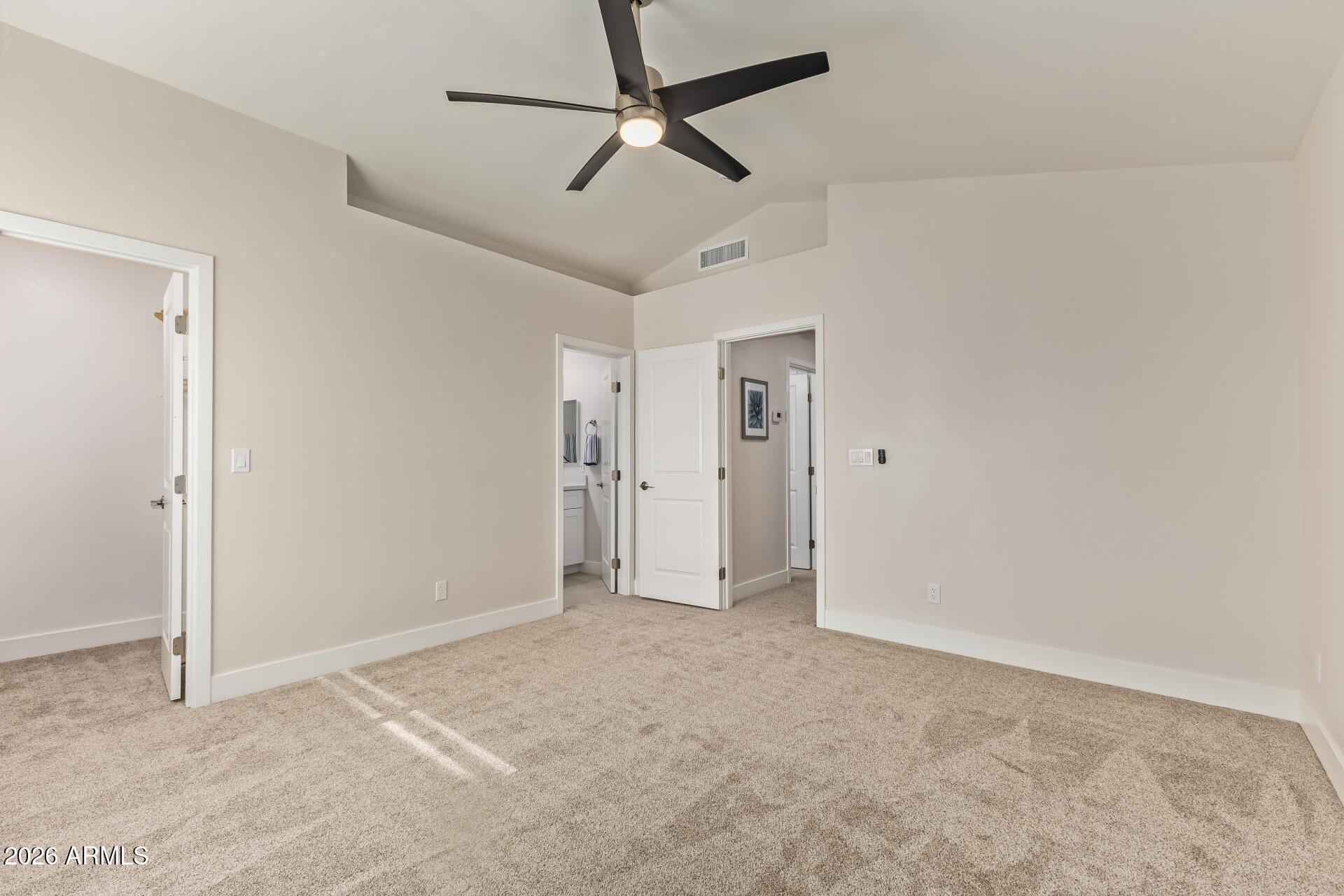 5808 East Brown Road, Unit 90 Mesa, AZ 85205 - Photo 16 of 29 an empty room with chandelier fan