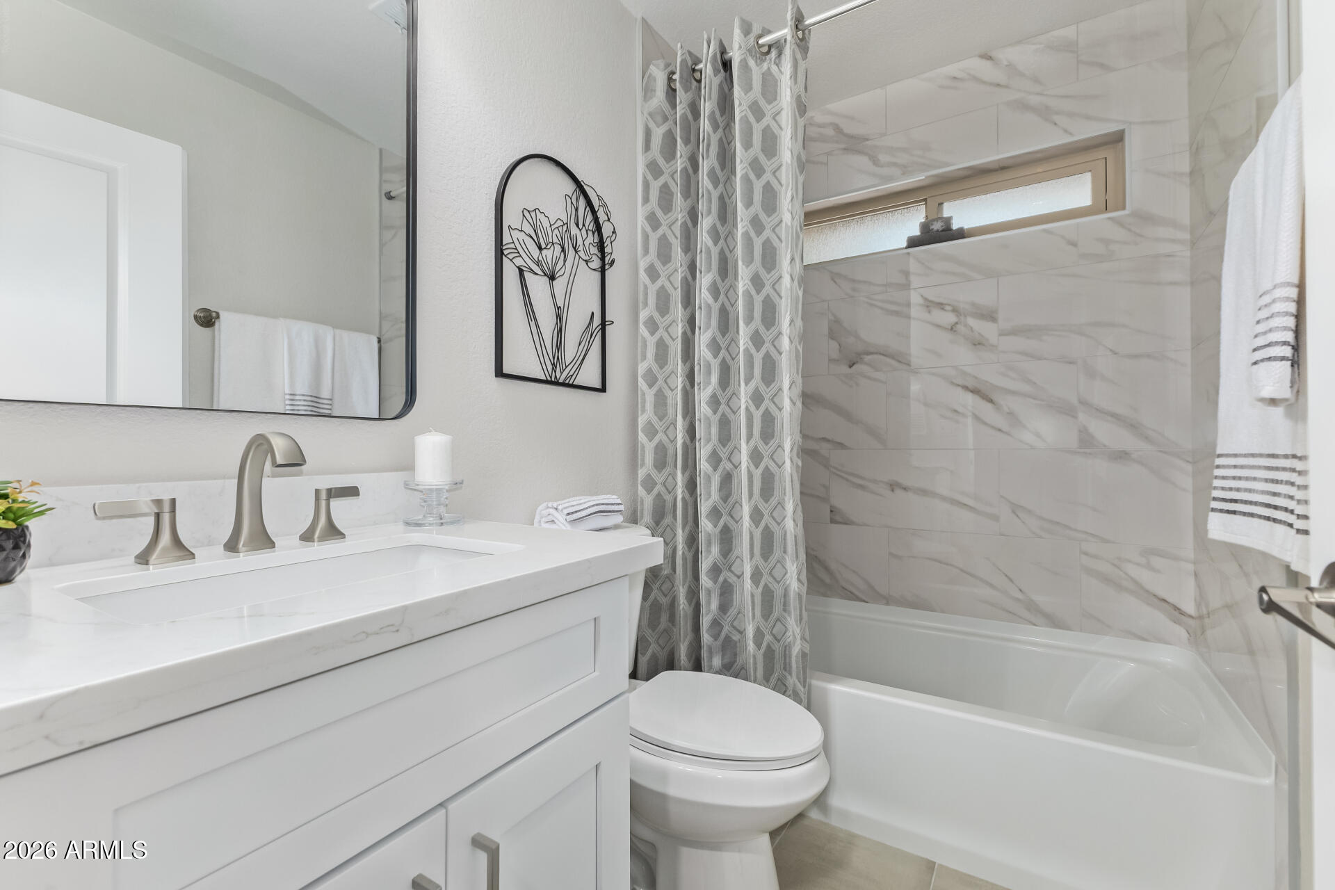 5808 East Brown Road, Unit 90 Mesa, AZ 85205 - Photo 21 of 29 a bathroom with a sink toilet and shower