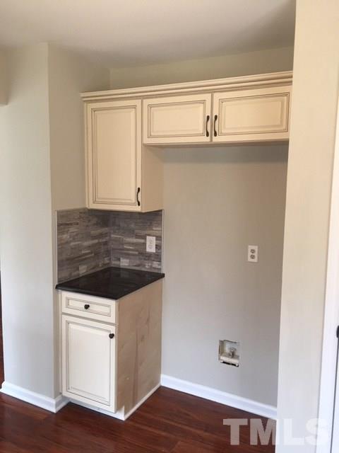 8105 Greywinds Drive Raleigh, NC 27615 - Photo 4 of 18 a utility room with a sink