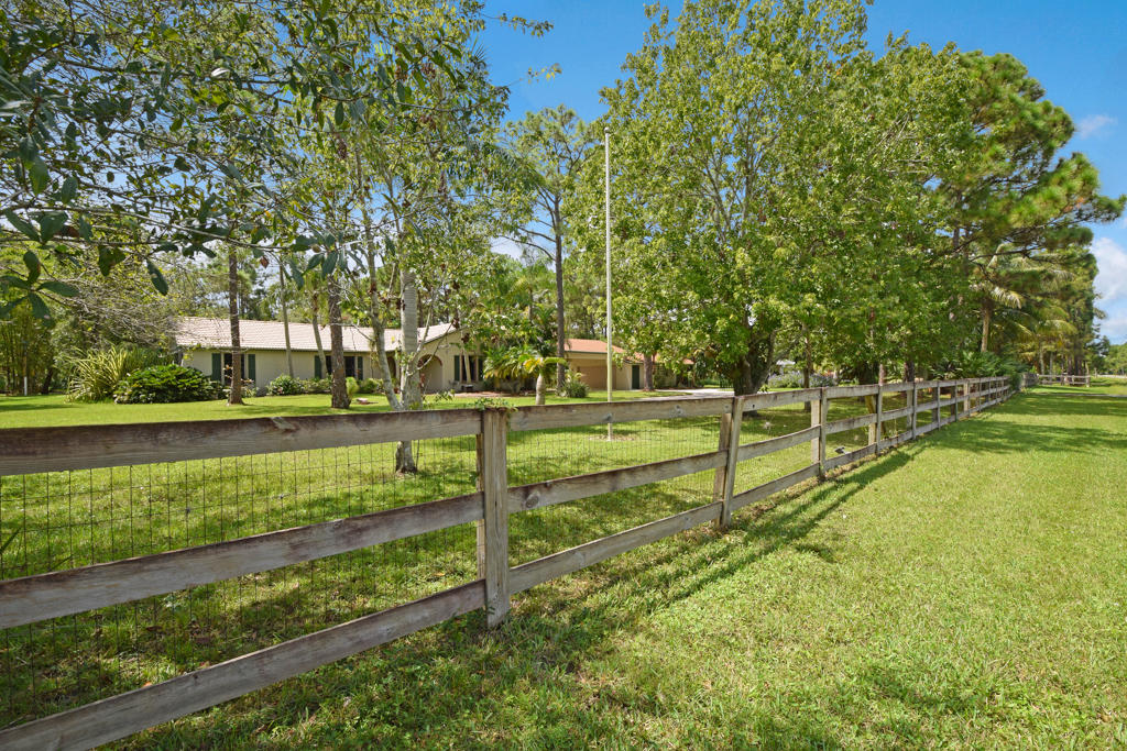 15429 Jupiter Farms Road Jupiter, FL 33478 - Photo 4 of 59 a view of a park with large trees