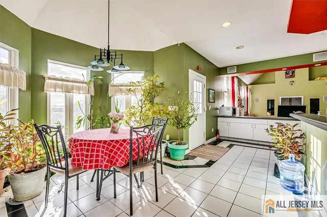 a very nice looking living room with a large window