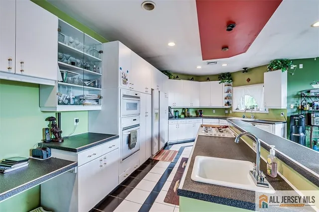 a room with furniture and flat screen tv