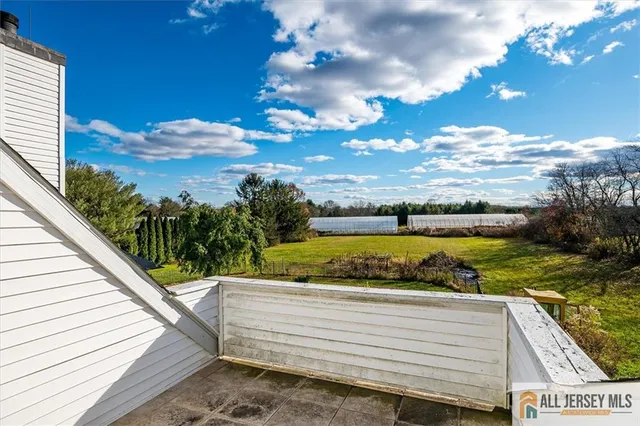 a view of a room with wooden walls