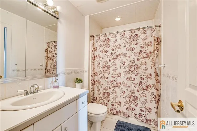 a house with swimming pool in front of it