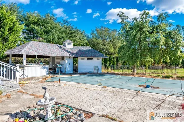 a view of yard along with trees