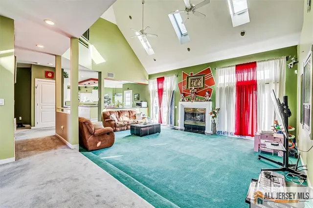 a kitchen with a sink appliances and cabinets