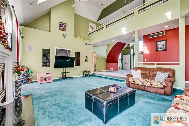 a outdoor dining space with furniture and chandelier