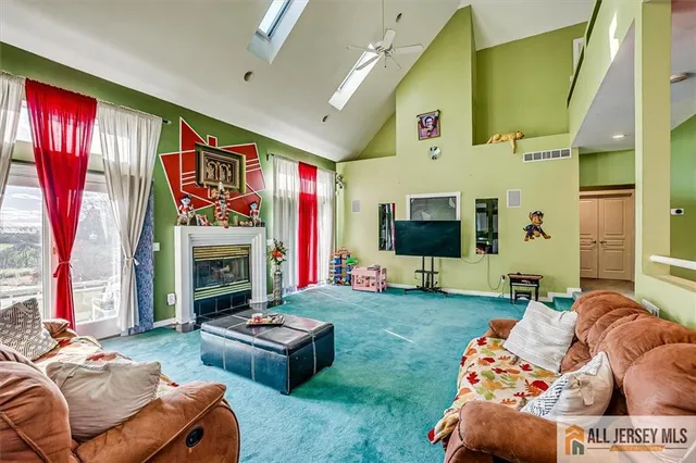 a kitchen with a sink a counter top space cabinets and stainless steel appliances