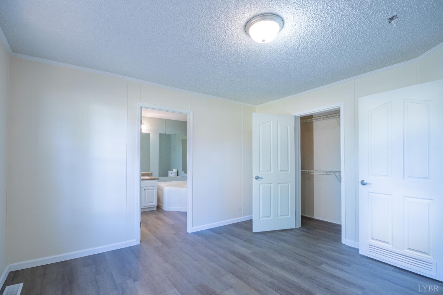 4791 Salem Road Spout Spring, VA 24593 - Photo 12 of 17 wooden floor in an empty room