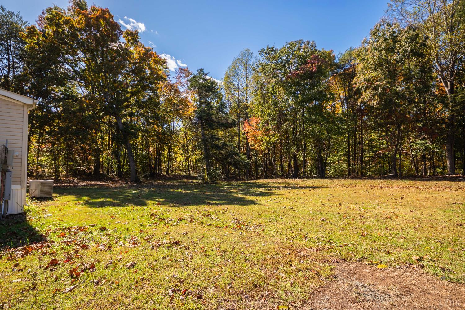4791 Salem Road Spout Spring, VA 24593 - Photo 17 of 17 a view of yard with swimming pool and trees