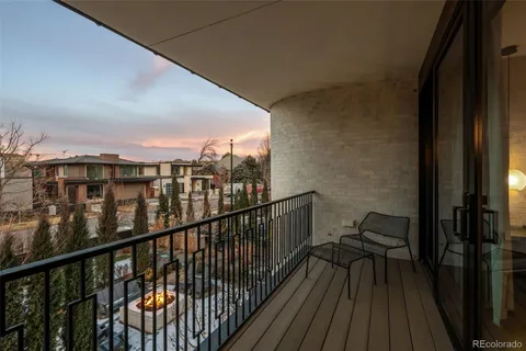 a view of balcony with furniture