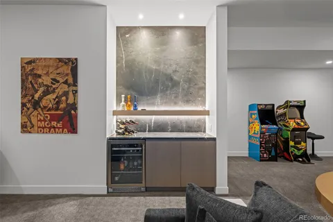 a view of a livingroom with furniture and toys