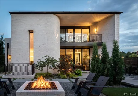 a view of swimming pool with outdoor seating