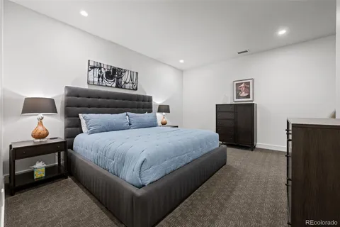 a bedroom with bed and window