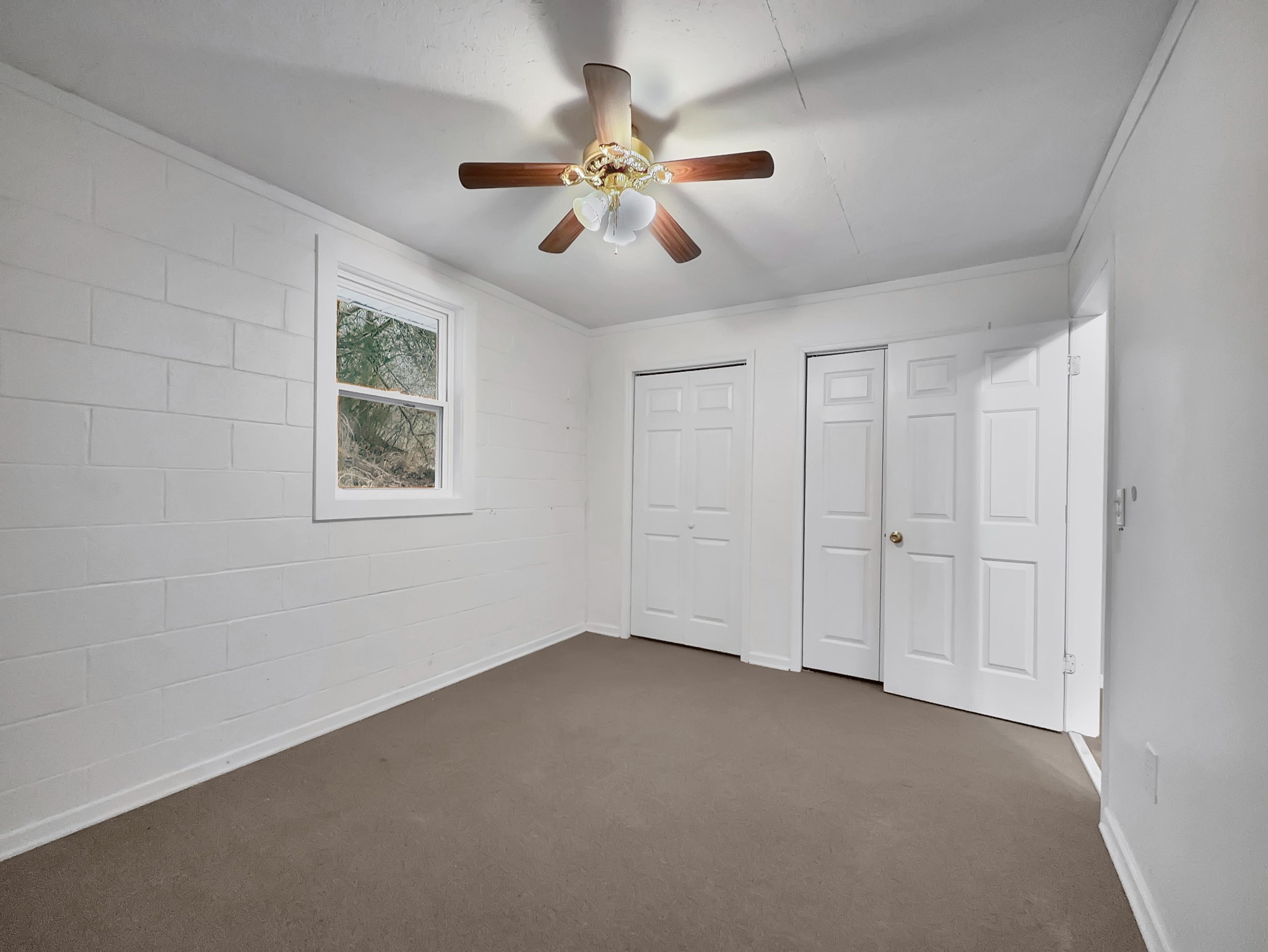 3337 Hartsville Road Lafayette, TN 37083 - Photo 9 of 17 a view of an empty room with a window