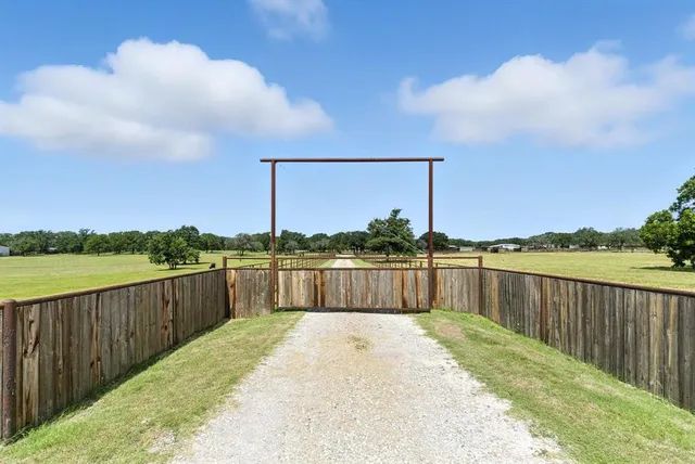 a view of swimming pool with a lake