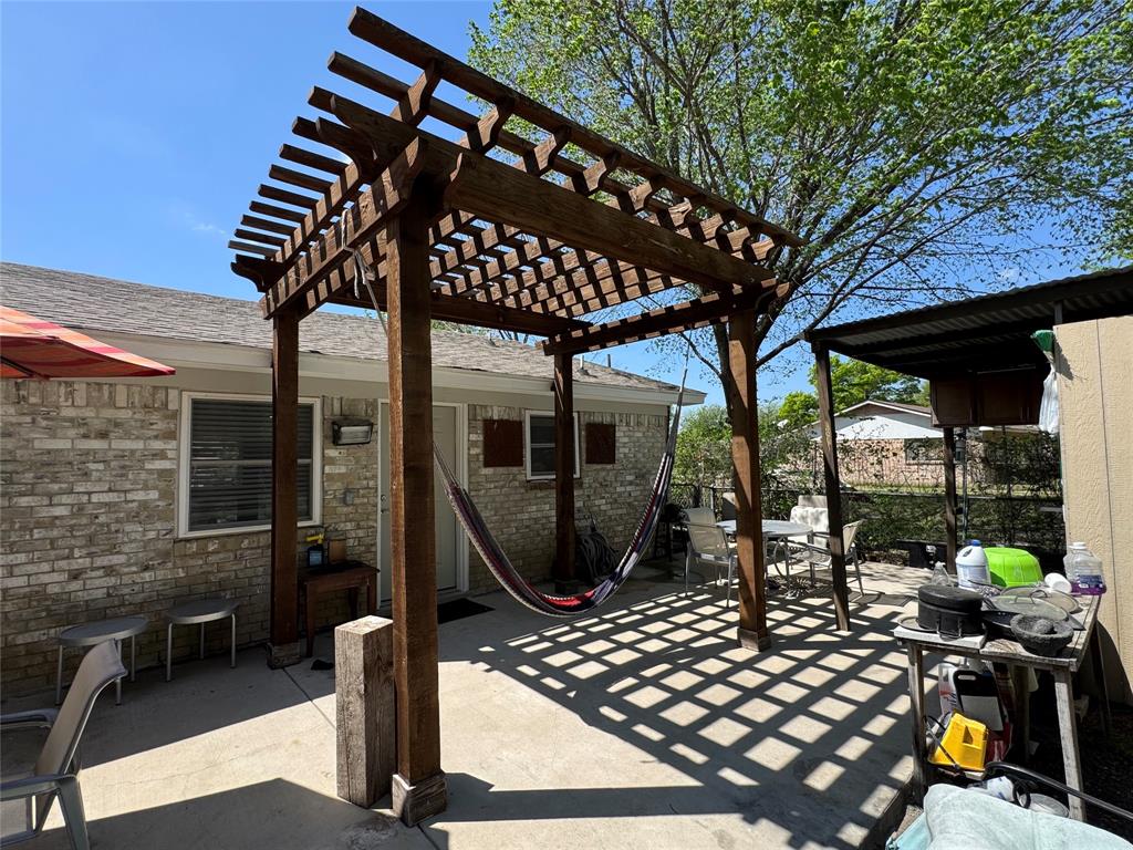 320 Pecan Street Wilmer, TX 75172 - Photo 17 of 25 View of patio / terrace featuring outdoor dining space and a pergola