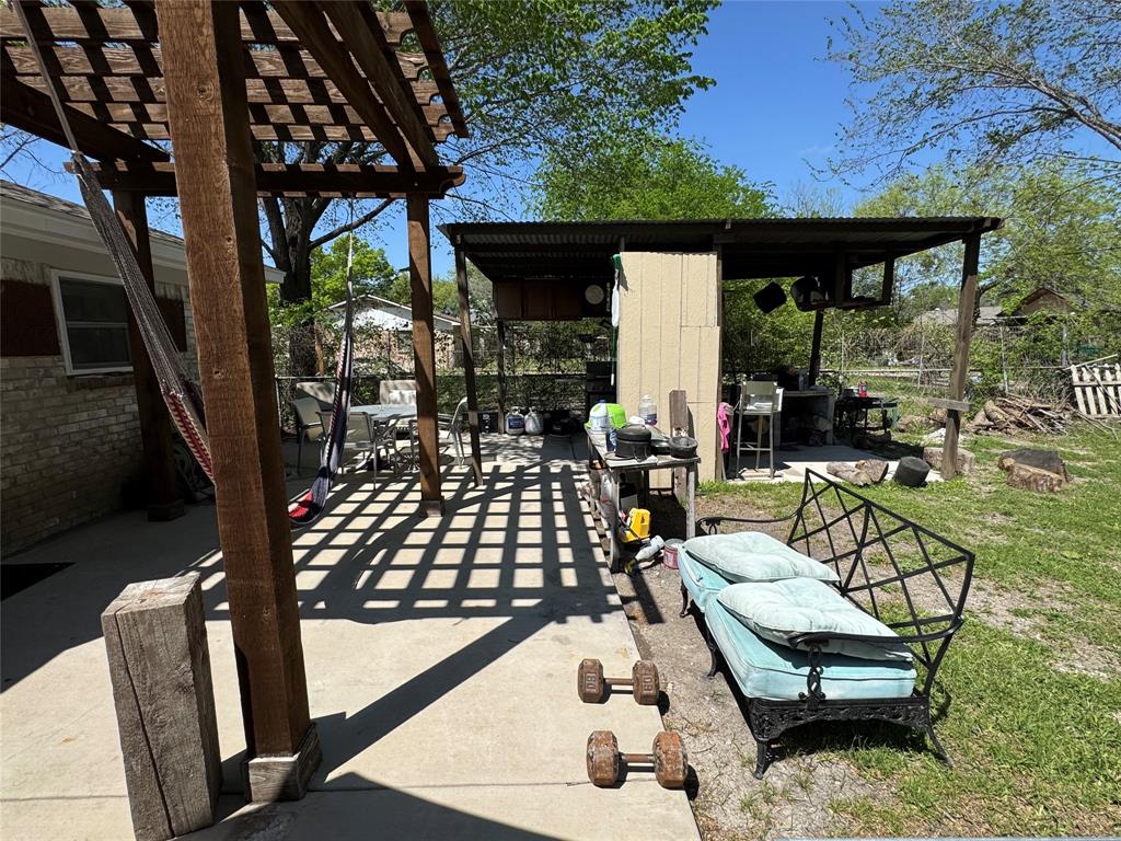 320 Pecan Street Wilmer, TX 75172 - Photo 18 of 25 View of patio with a pergola and outdoor dining area