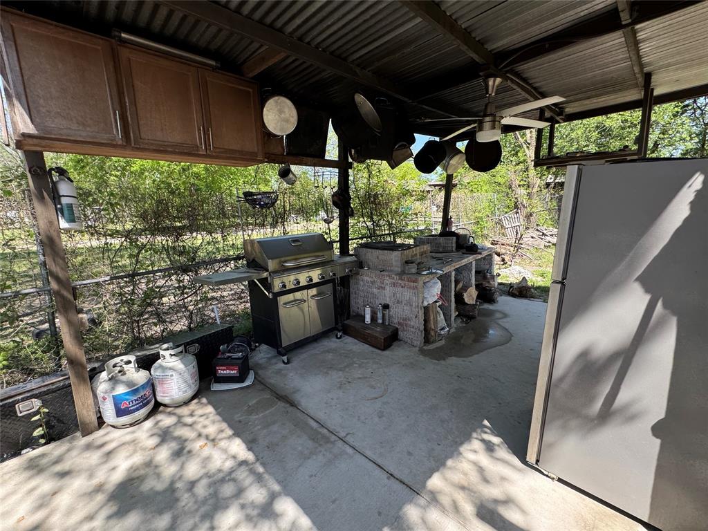 320 Pecan Street Wilmer, TX 75172 - Photo 19 of 25 View of patio / terrace featuring a grill