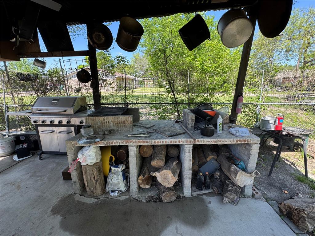 320 Pecan Street Wilmer, TX 75172 - Photo 20 of 25 View of patio featuring an outdoor kitchen