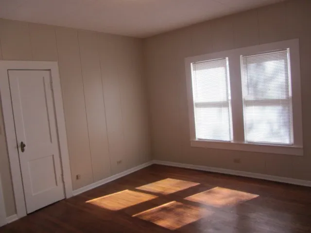 an empty room with window