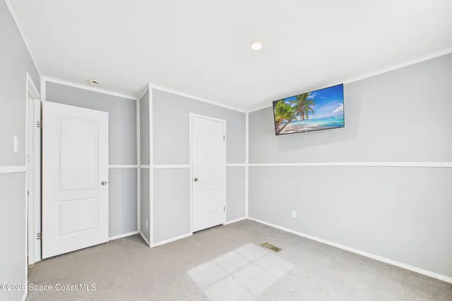 an empty room with a hallway