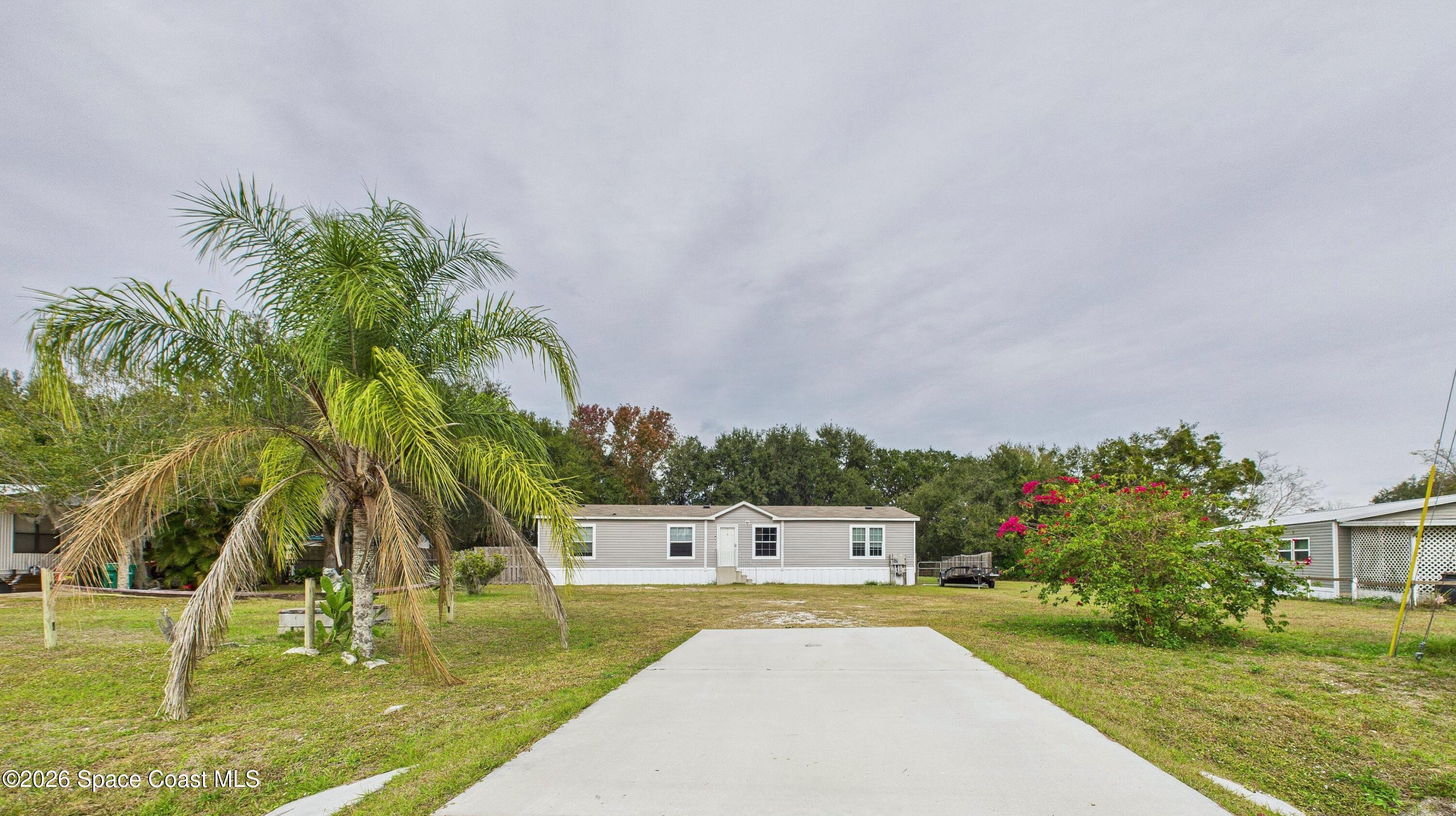 1948 Robi Circle Titusville, FL 32796 - Photo 2 of 45 CAM02690G0-PR0207-STILL057