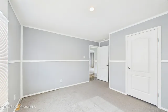 an empty room with closet