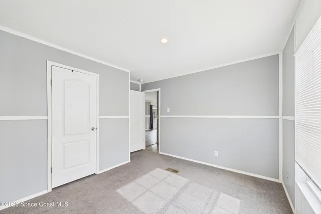 an empty room with closet