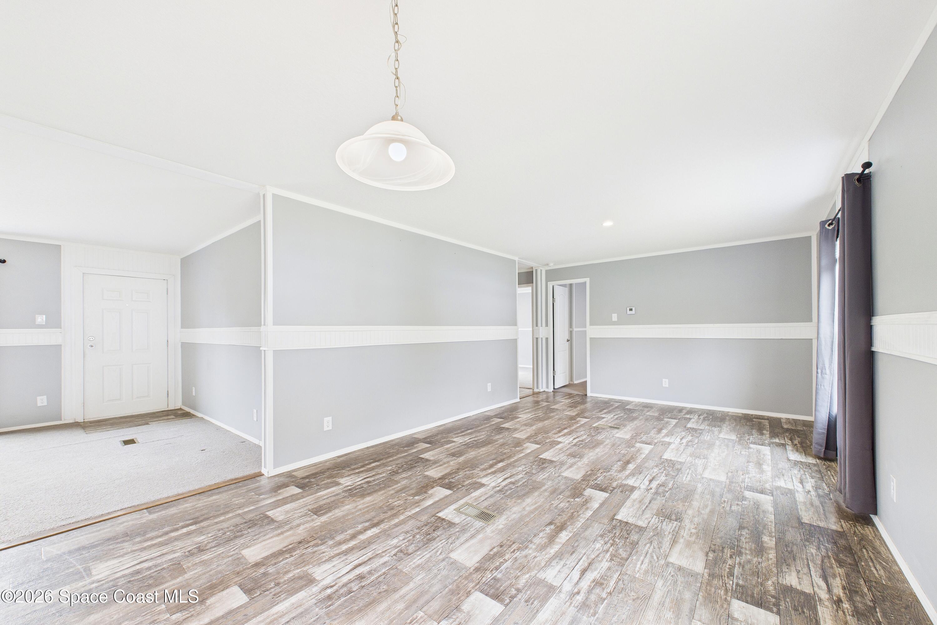 1948 Robi Circle Titusville, FL 32796 - Photo 5 of 45 CAM02690G0-PR0207-STILL009