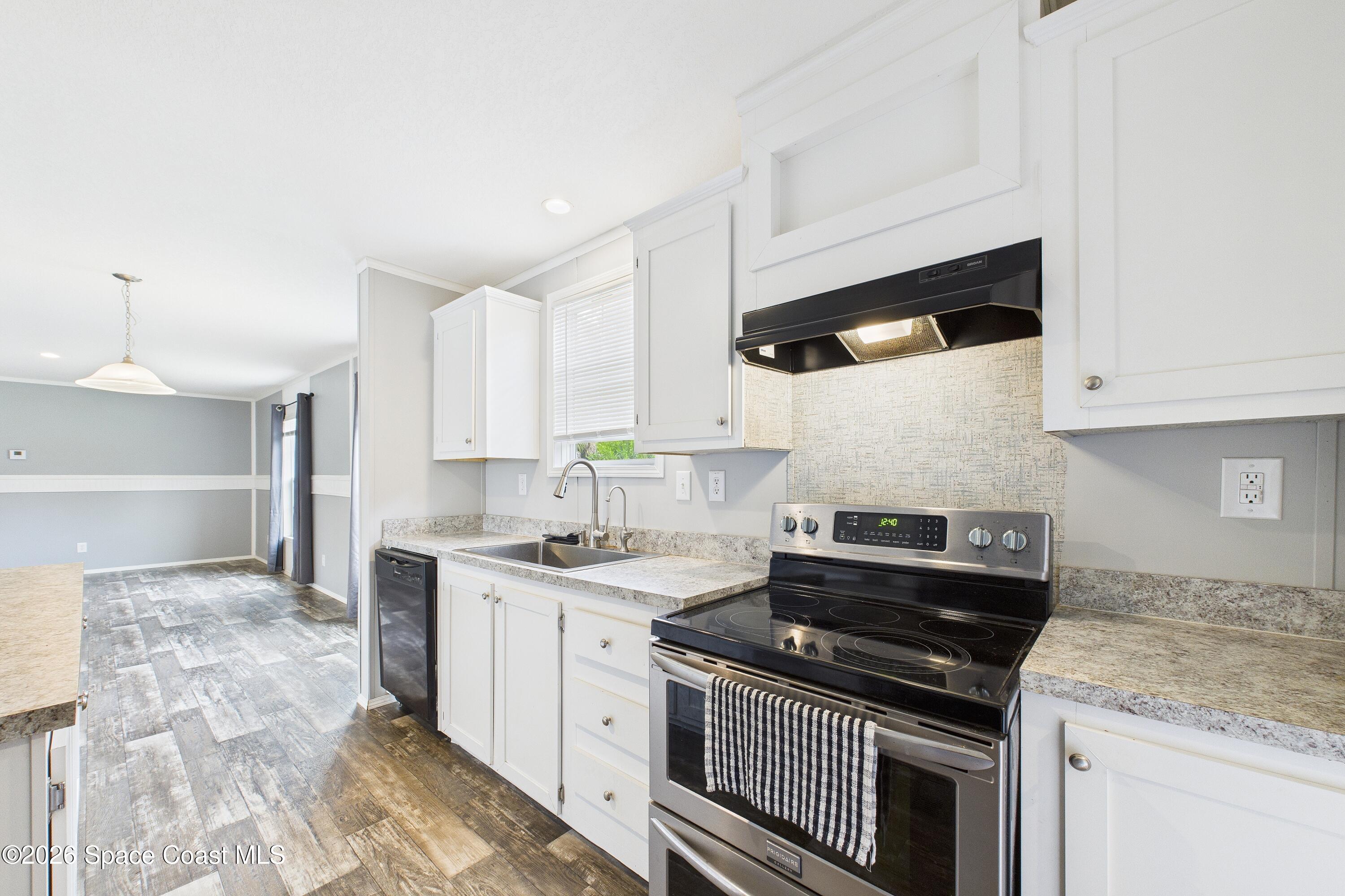 1948 Robi Circle Titusville, FL 32796 - Photo 9 of 45 CAM02690G0-PR0207-STILL018