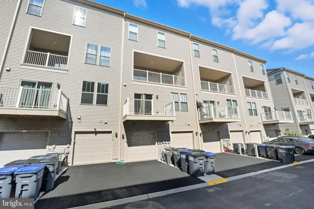 a front view of a building with outdoor space